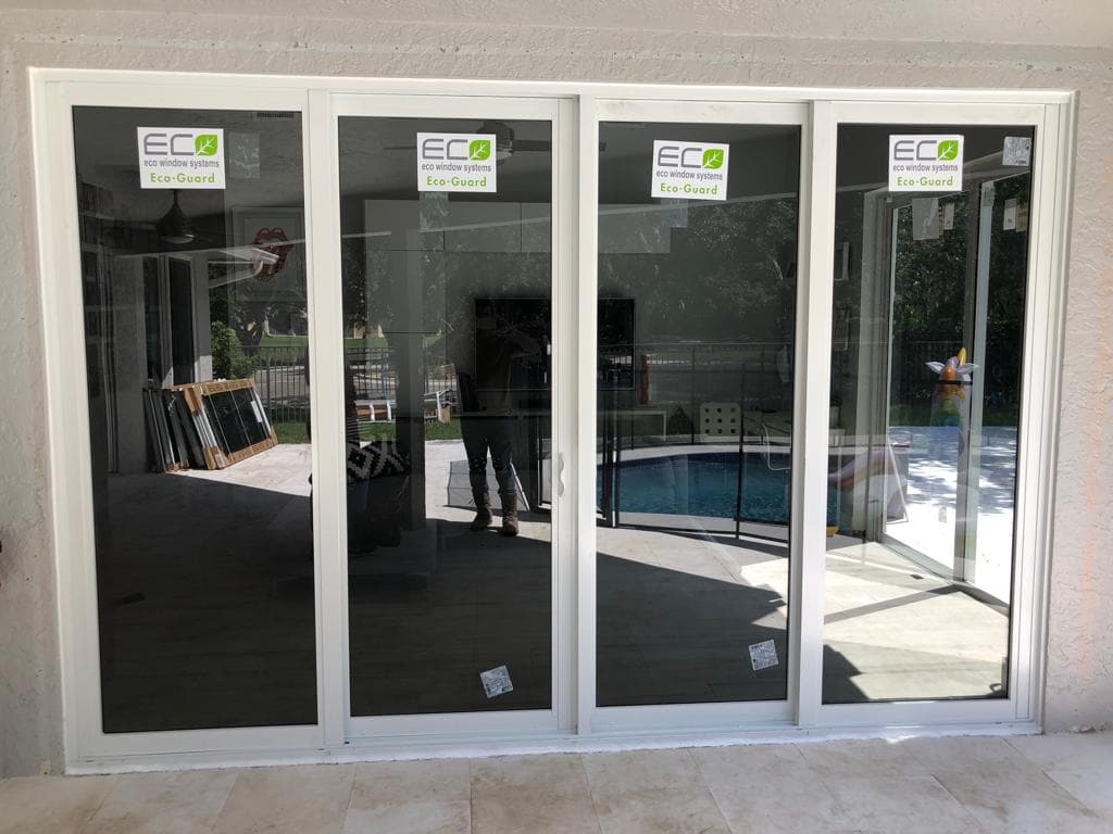 Energy efficient Low-E impact windows installed on a suburban home in Pembroke Pines Broward County Florida reducing energy costs