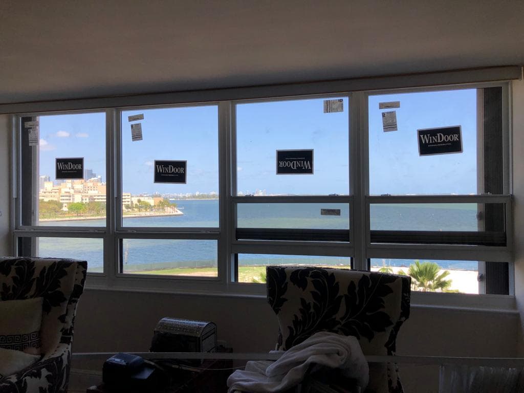 Impact rated sliding glass doors used as patio enclosure on a Florida home creating seamless indoor-outdoor living space