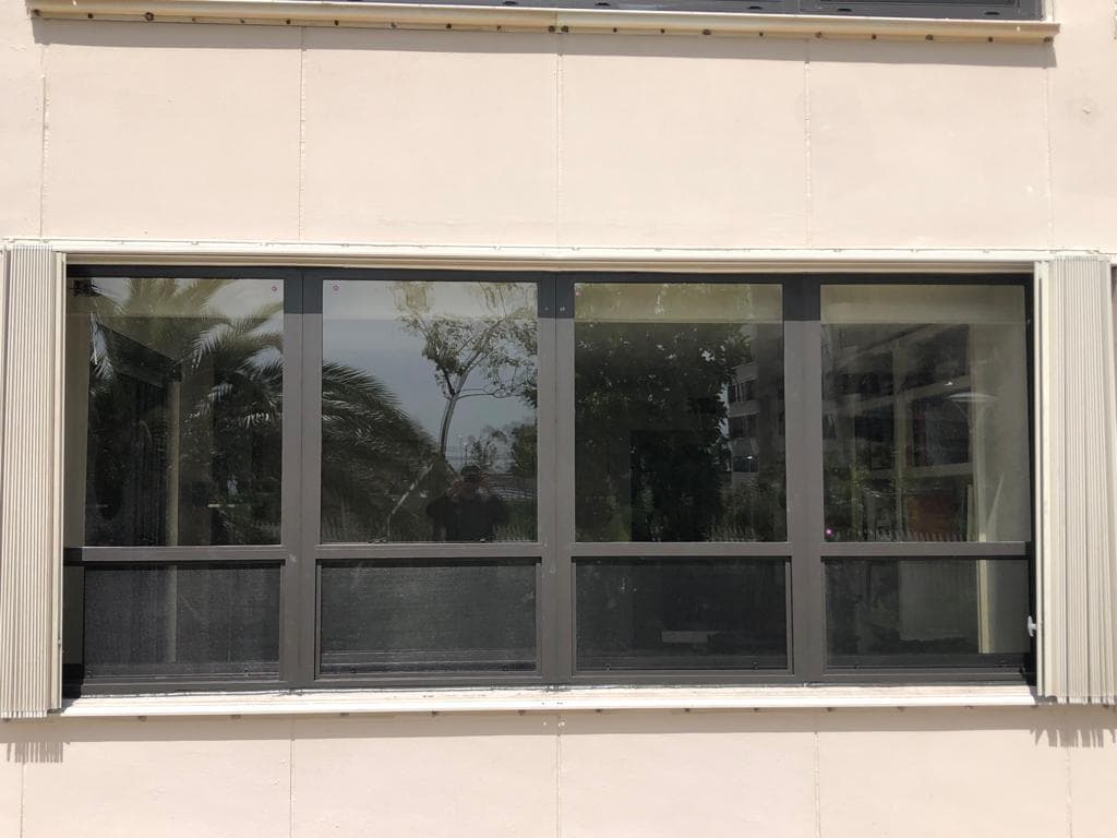 Professional hurricane impact windows installation on a Florida home in Miami with certified laminated glass and reinforced frames providing 175 mph wind protection