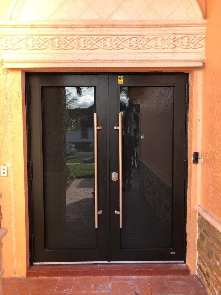 Low-E coating impact windows installed on a Florida home demonstrating significant energy savings with insulated glass technology and UV protection