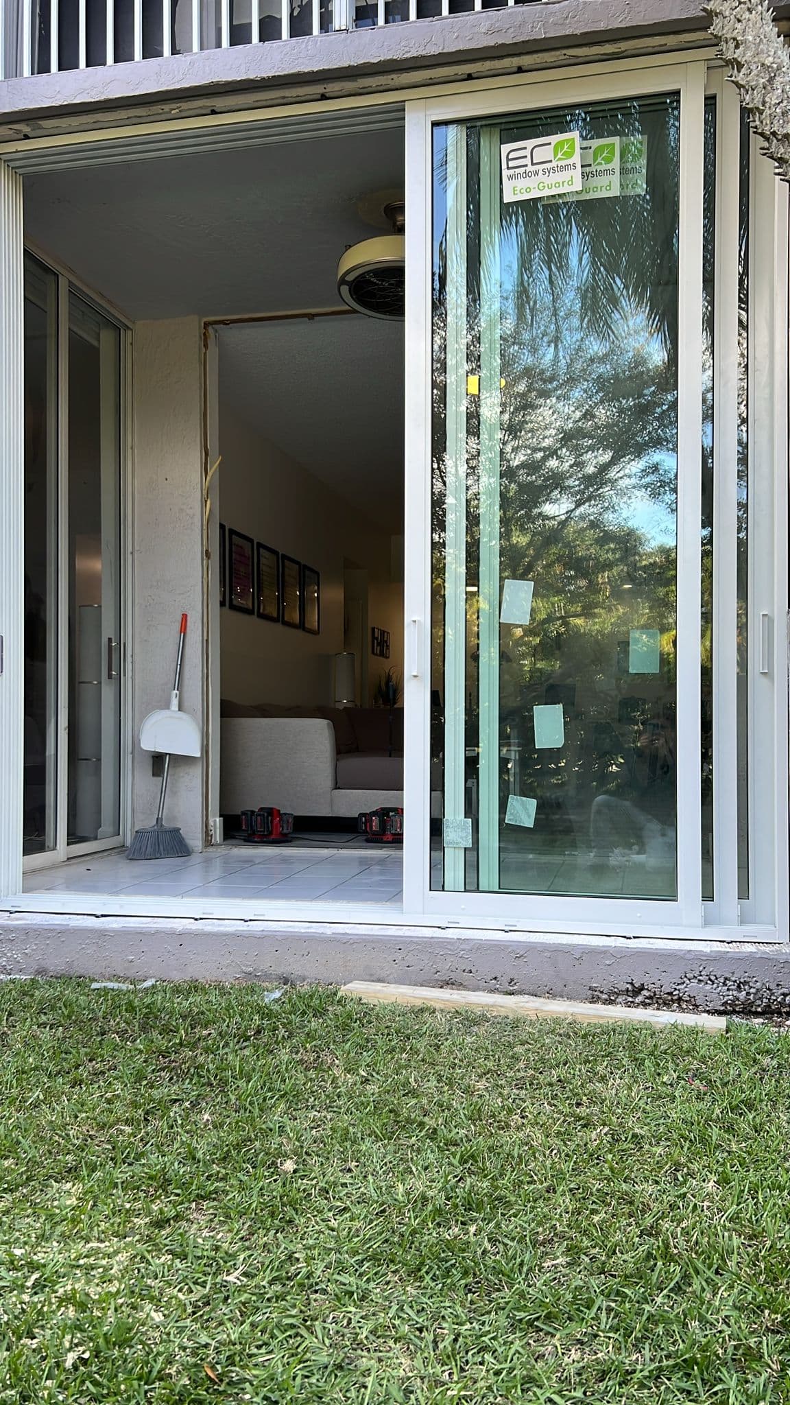 Photo showing multiple impact window openings installed on a Florida home demonstrating consistent quality across all window positions